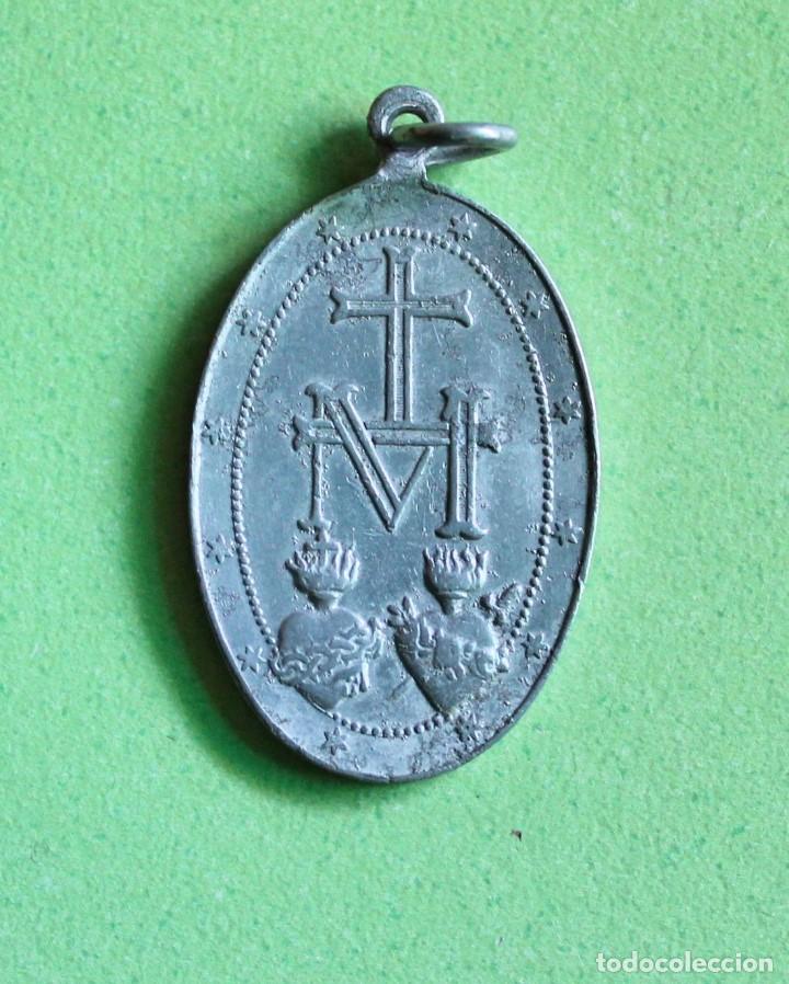 Antigua medalla Virgen María