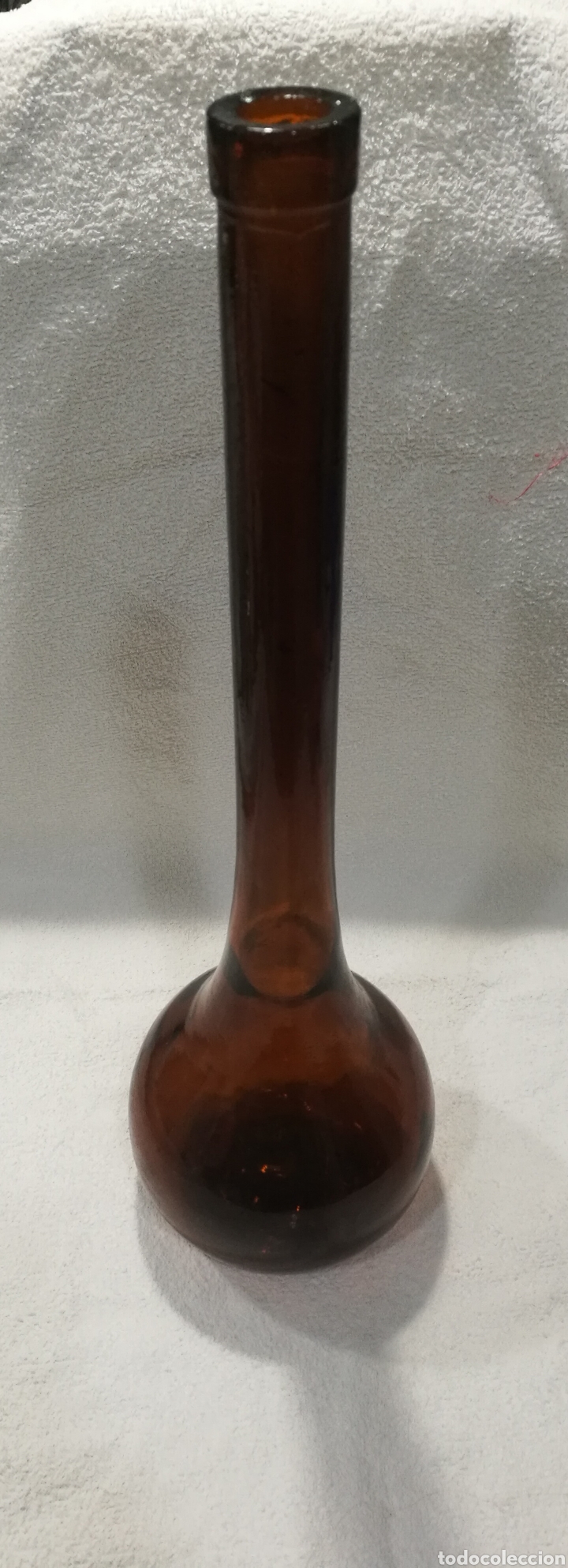 Antiguidades: Bonita y antigua botella de cristal