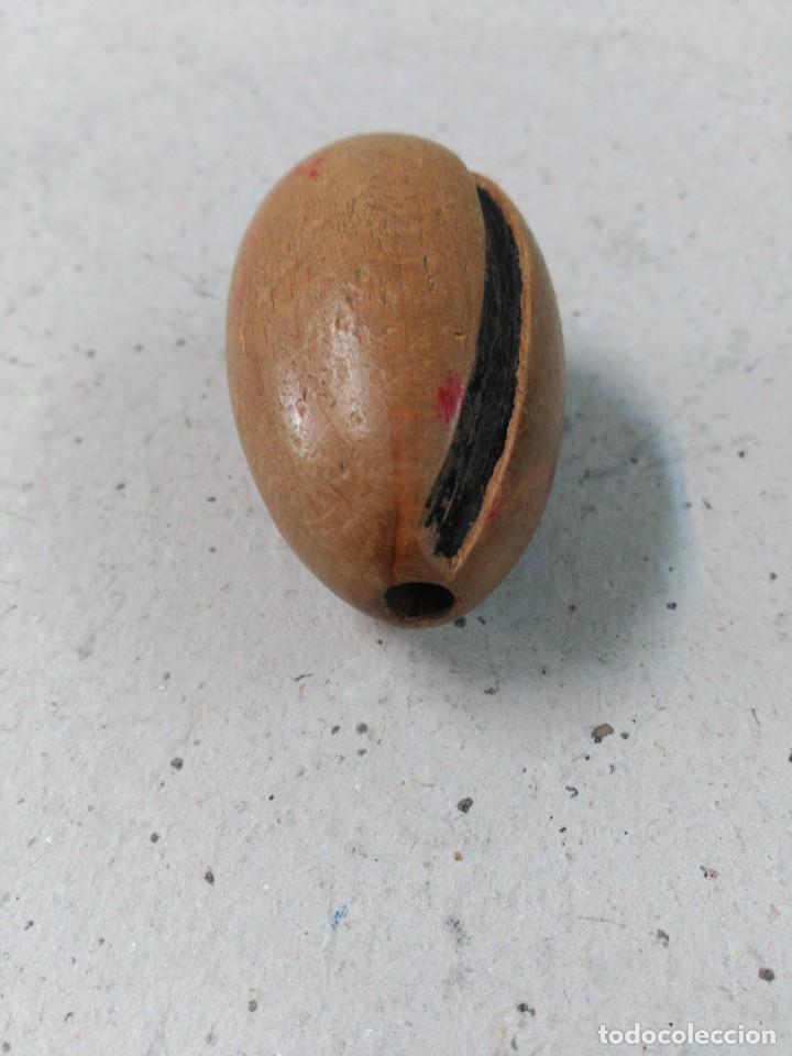 Huevo de madera para coser