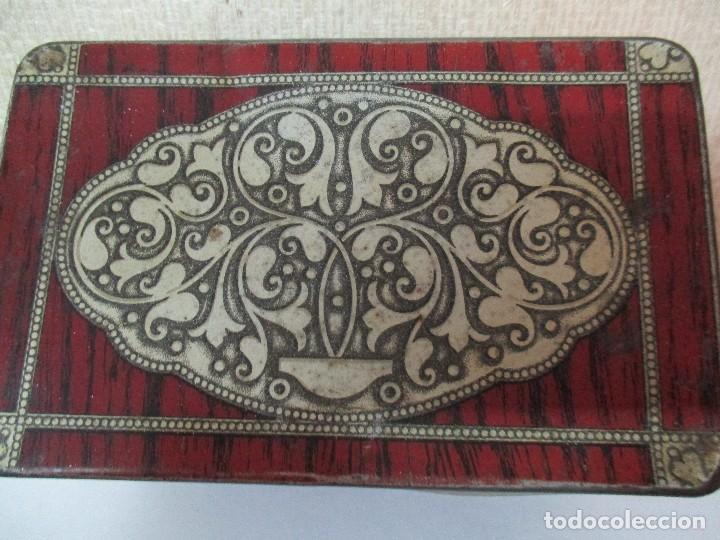 Antig&uuml;edades: caja de metal litografiada - Foto 1