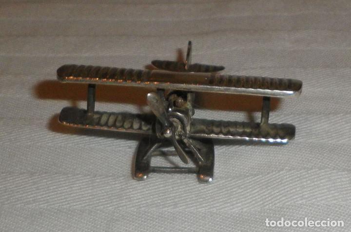 Antig&uuml;edades: avion hidroplano scwitch de plata con contraste - Foto 1