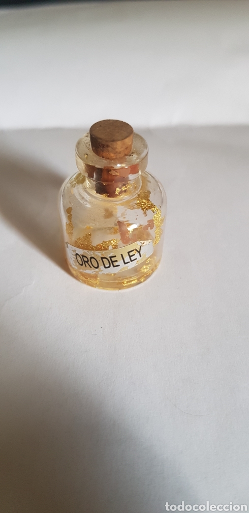 Antig&uuml;edades: Frasco con oro de ley - Foto 1