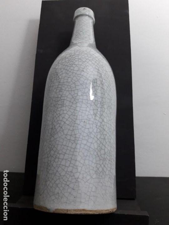 Antig&uuml;edades: Botella de ceramica - Foto 1