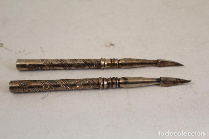 Antig&uuml;edades: 2 knife triangle plateados - Foto 1