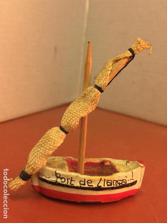 Antig&uuml;edades: Antigua barca de plomo en miniatura, PORT DE LLAN&Ccedil;A. Mide unos 4,5cms de largo