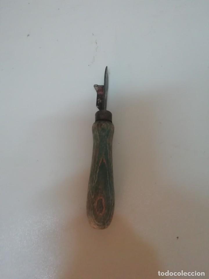 Antig&uuml;edades: Abrelatas - Foto 1