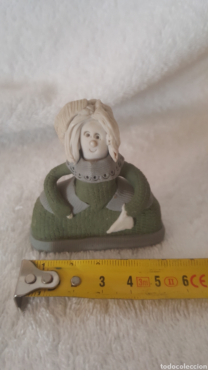 Antiquit&eacute;s: Menina de ceramica