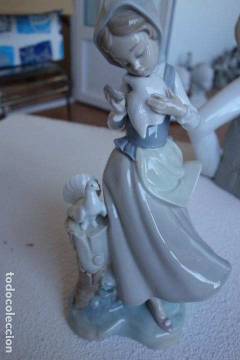 Antig&uuml;edades: Ni&ntilde;a con palomas de Lladro. - Foto 1