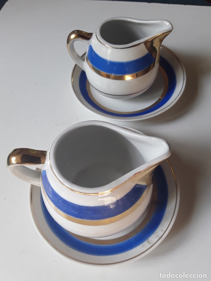 Antig&uuml;edades: Pareja de salseras con plato y adorno en azul cobalto y oro