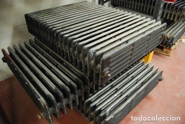 Antig&uuml;edades: Radiador de colgar en hierro fundido