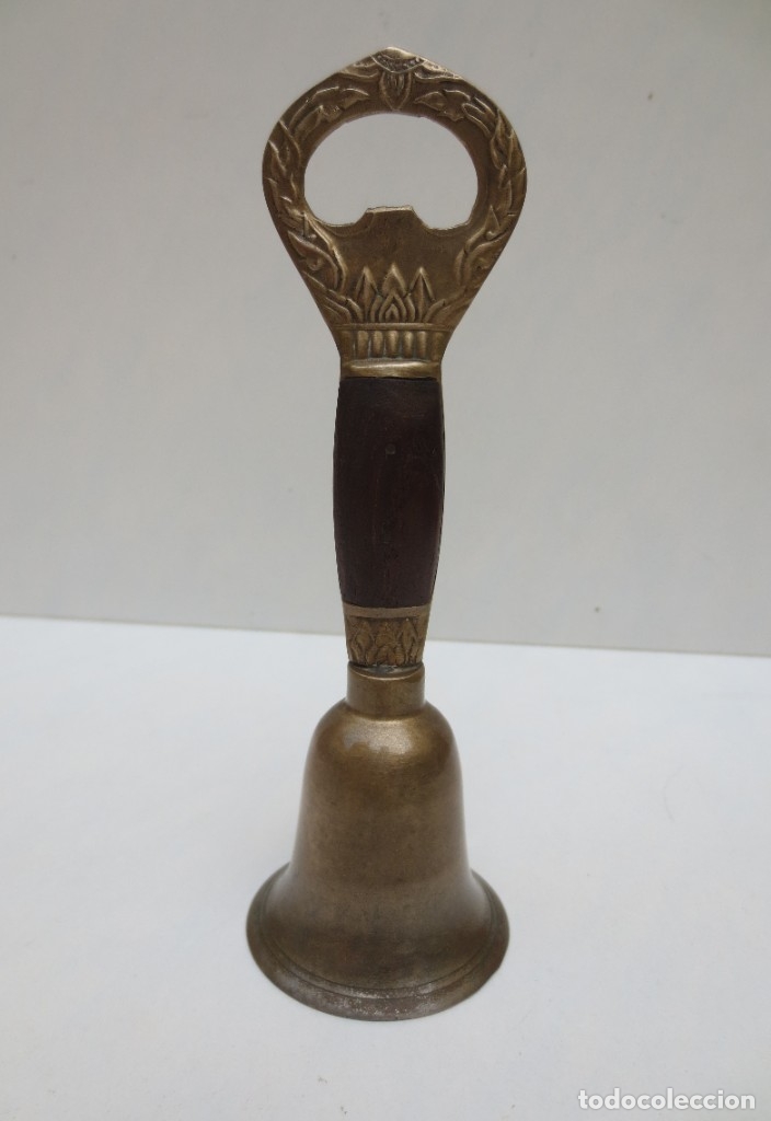 Antig&uuml;edades: CAMPANILLA DE MANO CON MANGO ABRIDOR BOTELLA . - Foto 1