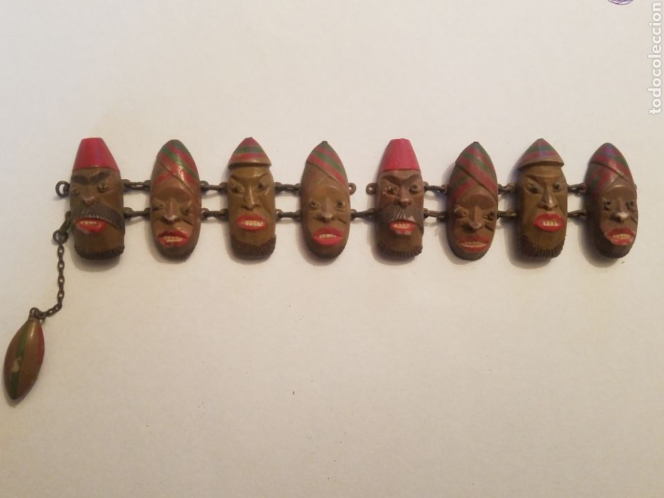 Antig&uuml;edades: ANTIGUA Y RAR&Iacute;SIMA PULSERA CARAS HECHA CON PLASTICO PASTA O ALGO PARECIDO