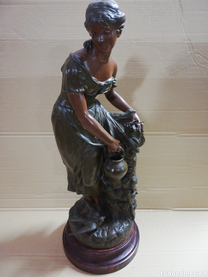 Antig&uuml;edades: Figura mujer en calamina