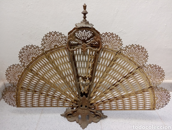 Salvachispas Ingles Con Forma De Pavo Real Muy Sold At Auction