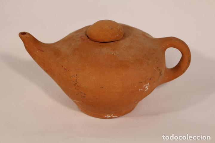 Antig&uuml;edades: candil de aceite, lampara de aladino en terracota