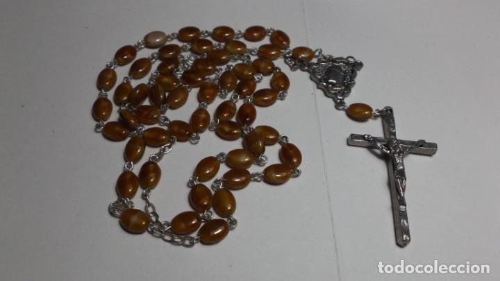 Antig&uuml;edades: 85 - ROSARIO CON LAS CUENTAS EN PEPITAS OVALADAS MARRON. - Foto 1
