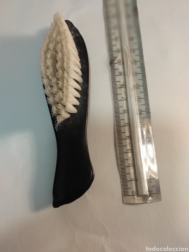 Antiques: Cepillo de viaje para ropa