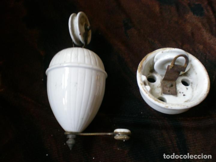 Antig&uuml;edades: ANTIGUA POLEA Y CONTRAPESOS DE LOZA - Foto 1
