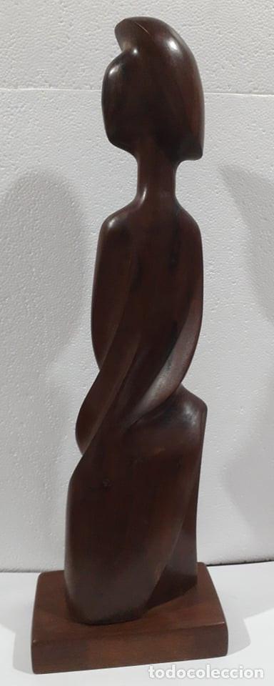 Antiques: Escultura tallada en caoba