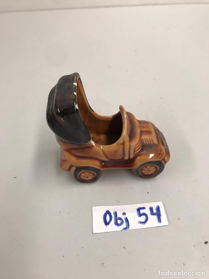 Antiques: Coche de porcelana