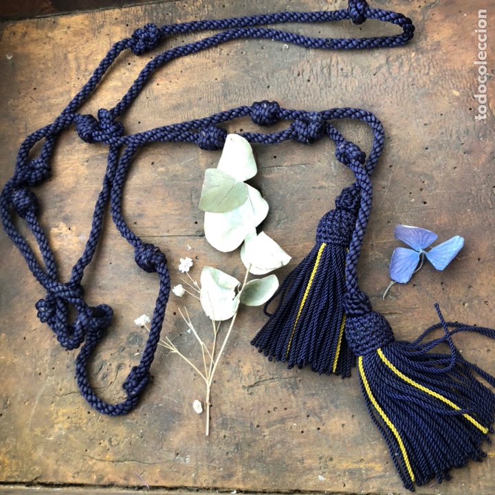 Antiquit&auml;ten: Cord&oacute;n azul morado oscuro con fleco de canutillo de borlas con su papel de envoltorio Recondo Ir&uacute;n
