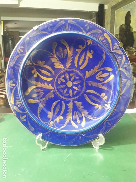 Antig&uuml;edades: Plato de ceramica azul y oro - Foto 1