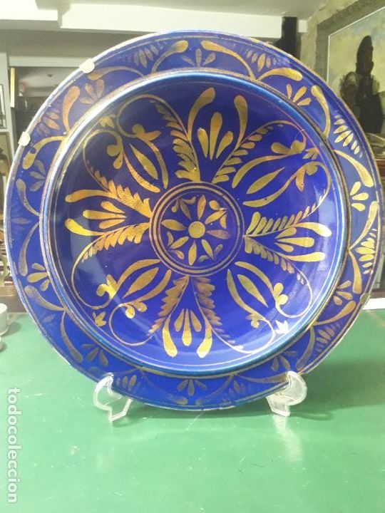 Antig&uuml;edades: Plato de ceramica azul y oro - Foto 1