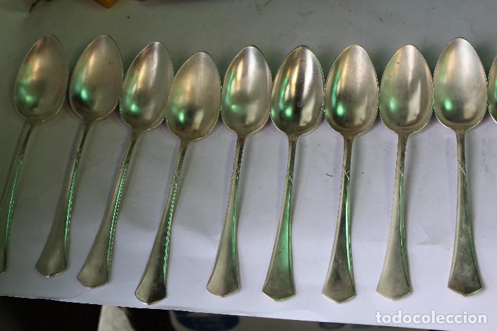 Antig&uuml;edades: 9 cucharas de alpaca plateada - Foto 1