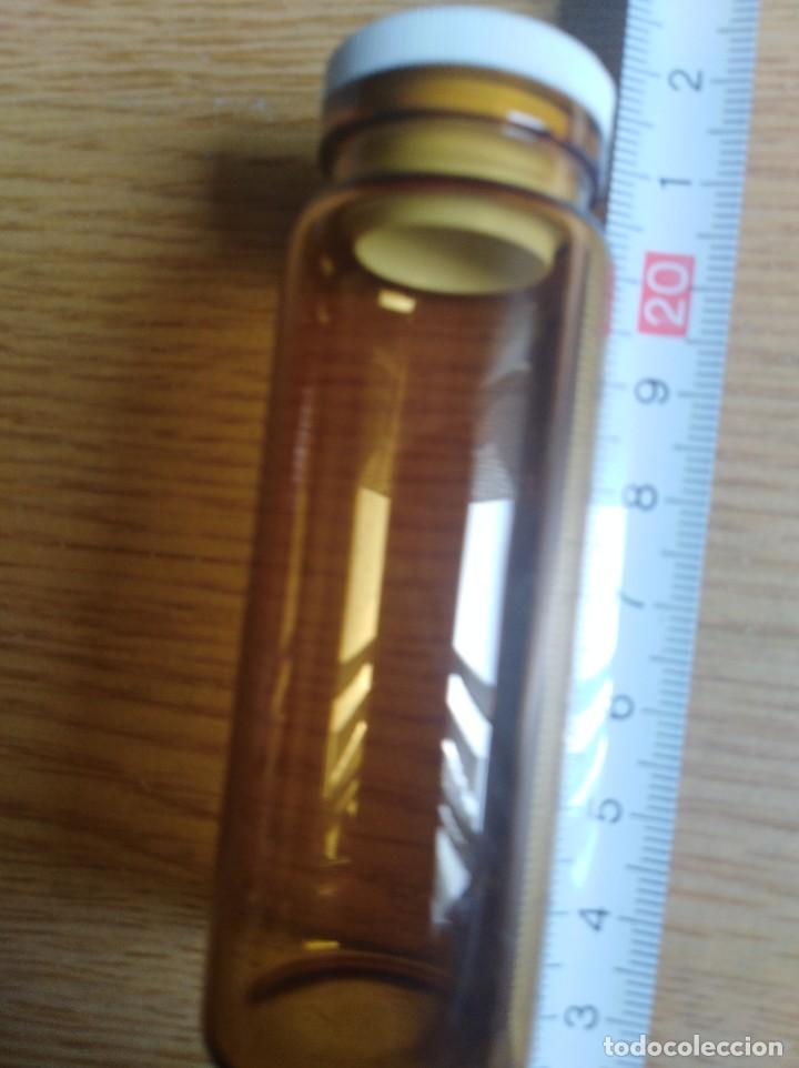 Antig&uuml;edades: Frasco de cristal de medicina 595
