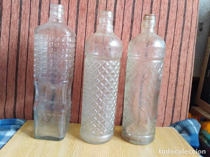 Antiquit&eacute;s: 3 botellas de cristal (801)