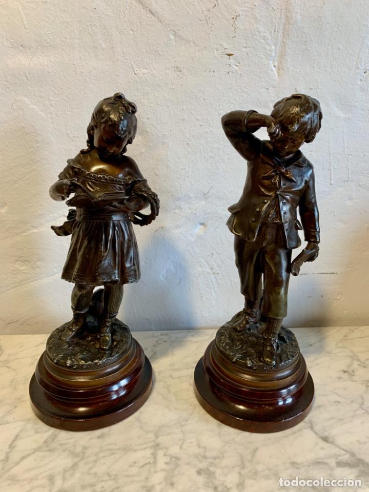 Antig&uuml;edades: ANTGUA PAREJA DE FIGURAS EN CALAMINA - Foto 2