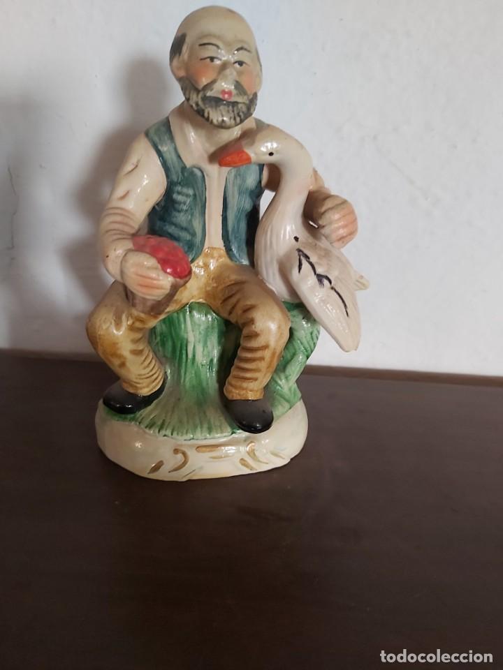 Antig&uuml;edades: figura el viejo y el pato - Foto 1