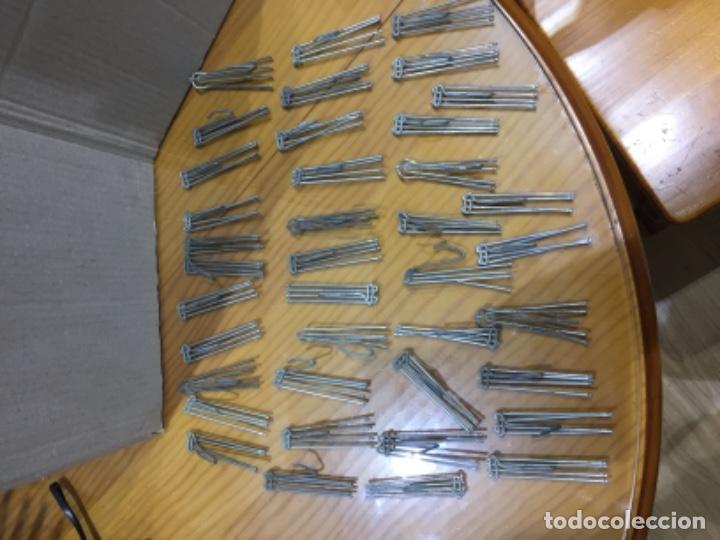 Antig&uuml;edades: Ganchos de cortinas - Foto 1