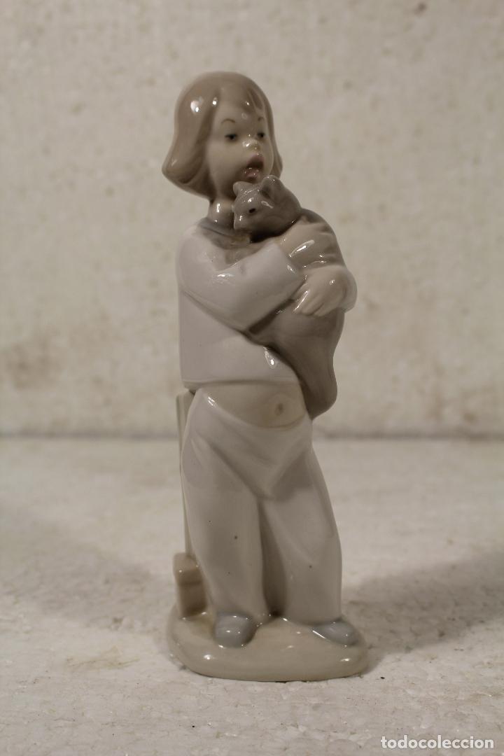 Antiguidades: figura ni&ntilde;a con gato. sello made in spain hand made-