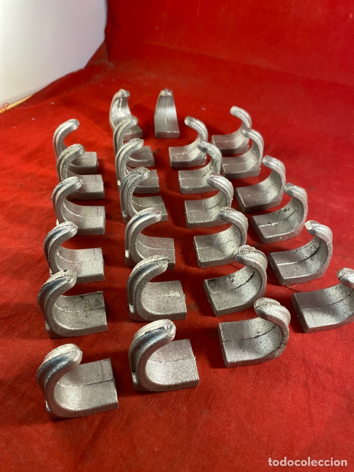Antiquit&eacute;s: Lote de garzas o Sujeta barras . de metal
