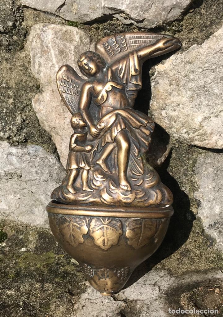 Antig&uuml;edades: Antigua benditera de bronce - Foto 1