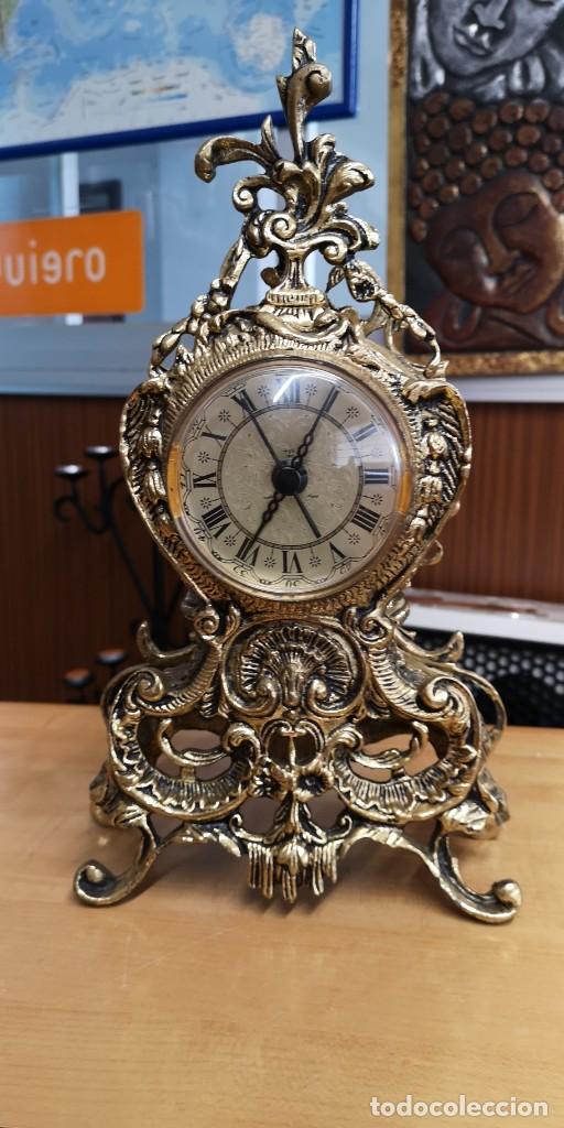 Antiquit&auml;ten: Reloj y candelabros tres brazos