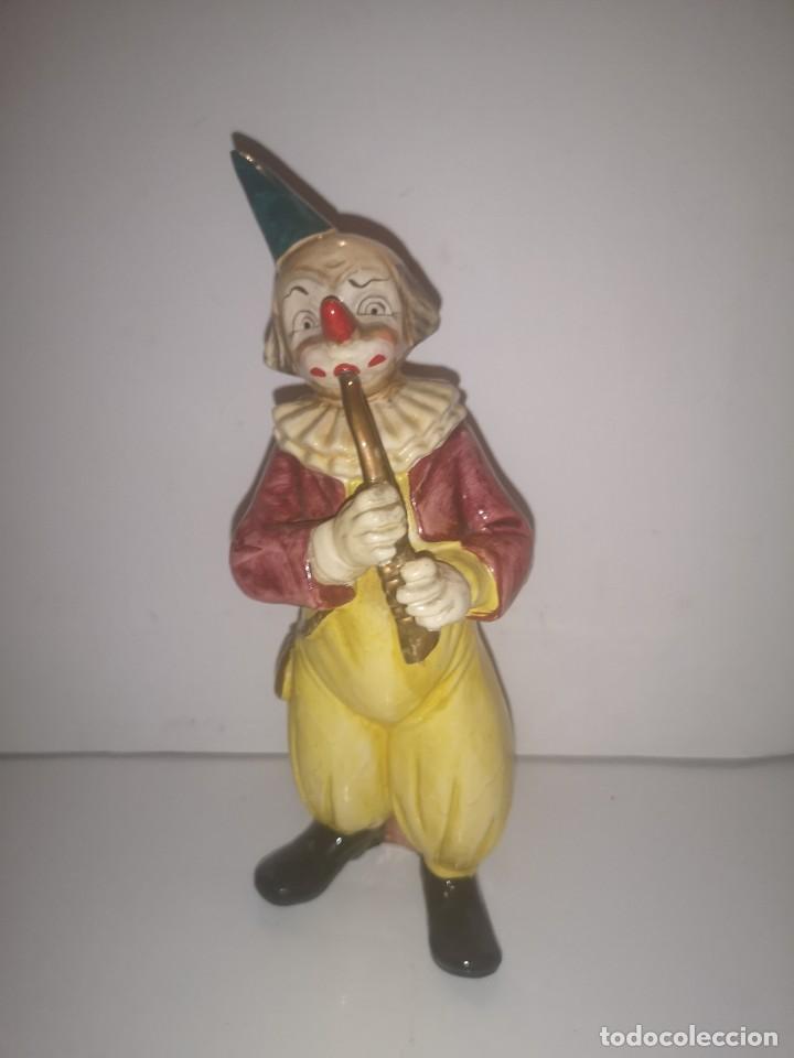 Antiguidades: Figura de porcelana
