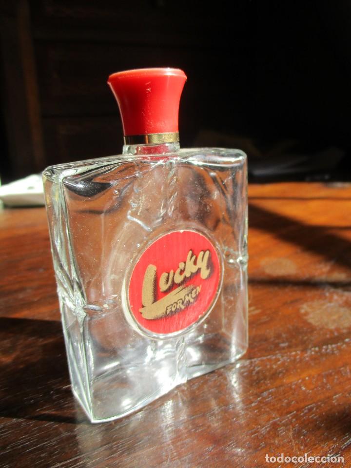 Antig&uuml;edades: botella perfume o similar luchy - Foto 1