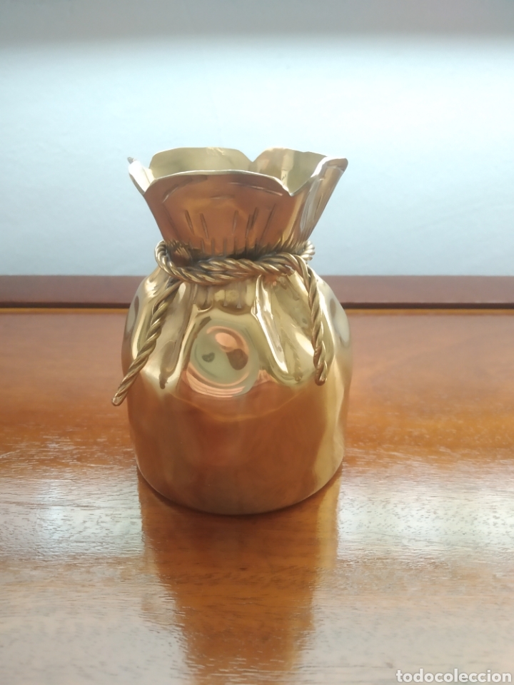 Antiques: Almazan, saco de banquero dorado