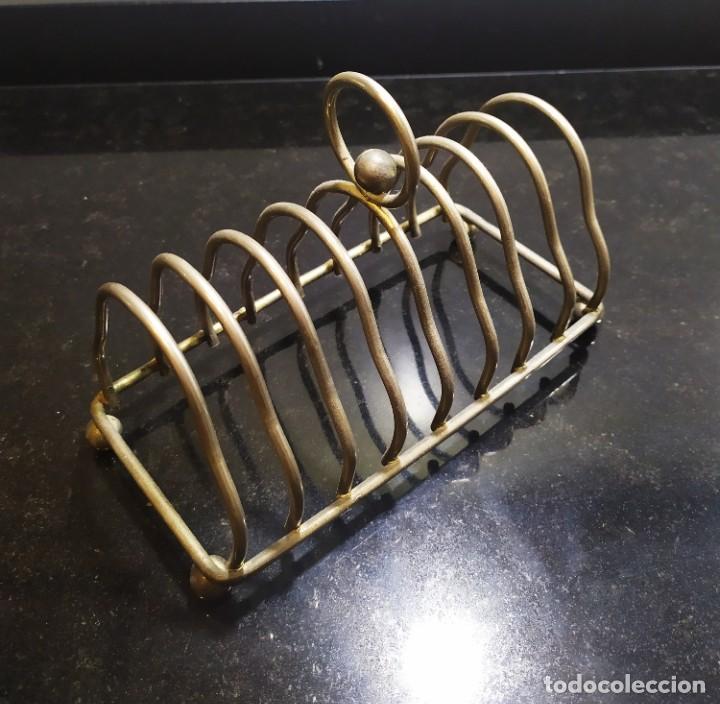 Antig&uuml;edades: ANTIGUO SOPORTE METALICO PARA REBANADAS DE PAN.