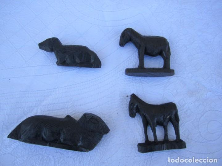 Antig&uuml;edades: lote de cuatro animales en madera de ebano - Foto 1
