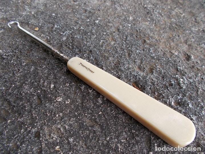 Antig&uuml;edades: ABOTONADOR CON MANGO DE MARFIL - Foto 2