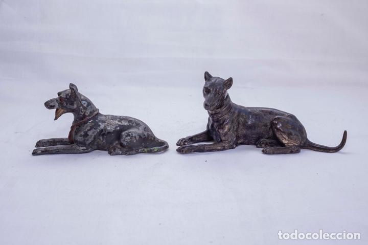 Antiguidades: Perros de Bronce