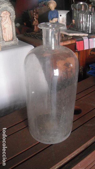 Antiquit&eacute;s: frasco de farmacia de cristal soplado