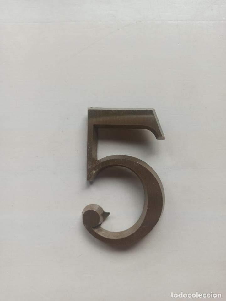 Antiguidades: N&uacute;mero para colgar