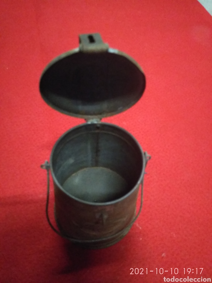 Antig&uuml;edades: Recipiente antiguo para liquidos