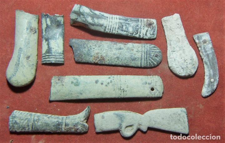 Antig&uuml;edades: Lote de 9 fragmentos de cachas de navaja - Foto 1