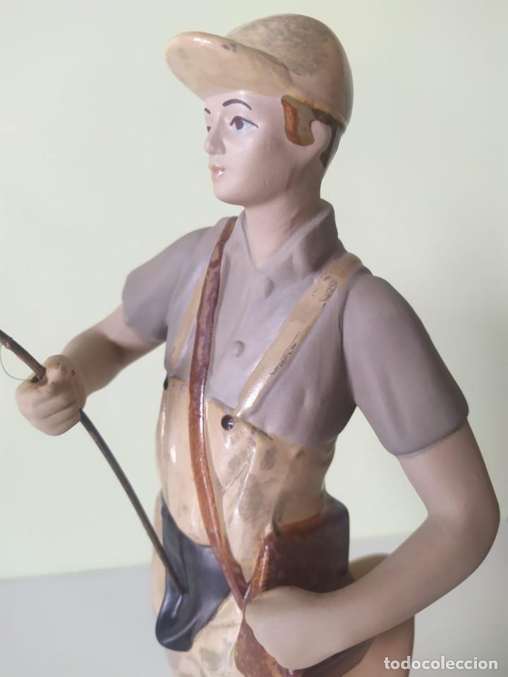 Antiguidades: Figura porcelana pescador