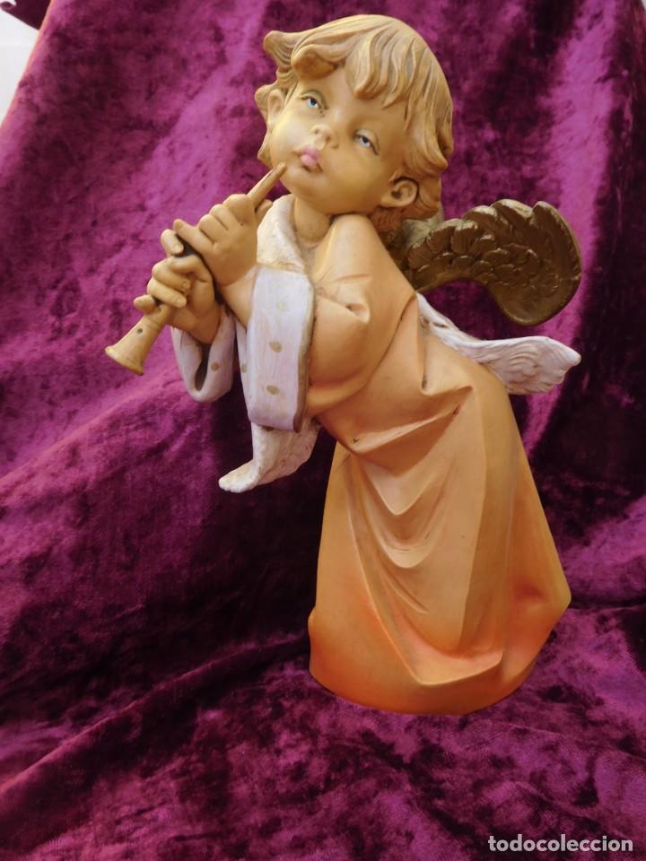 Antig&uuml;edades: ANGEL TOCANDO LA TROMPETA.MEDIDA: 20CM